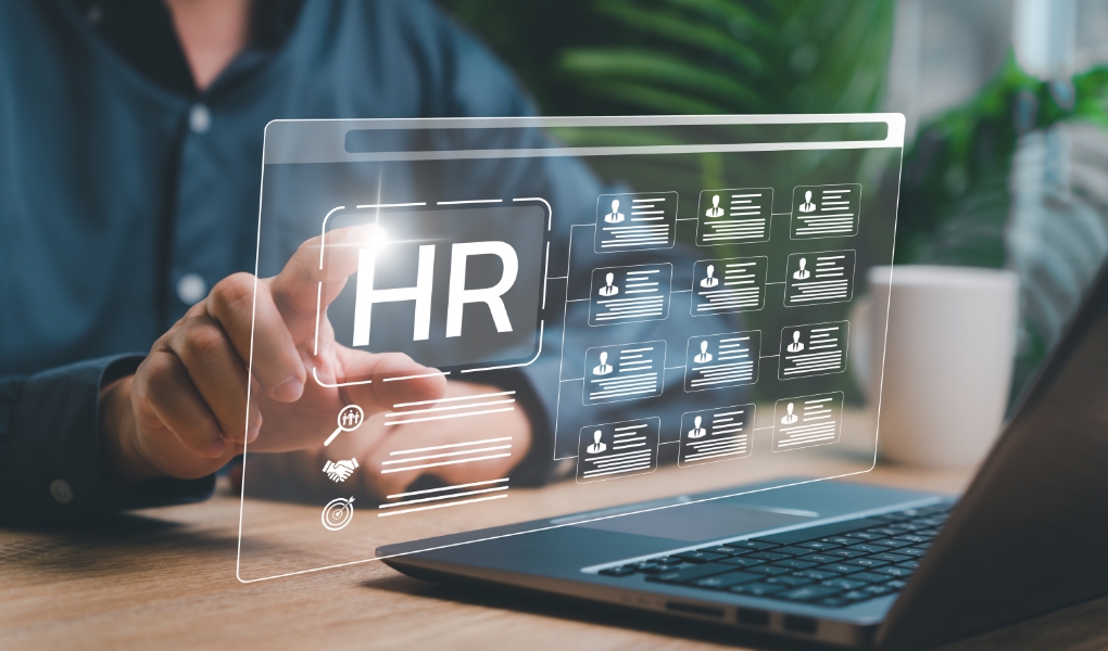HR team working with employee systems and hiring tools